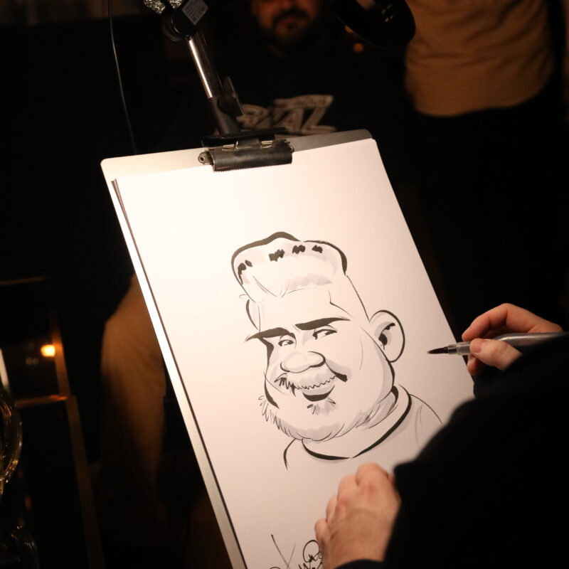 Weihnachtsfeier Karikaturist